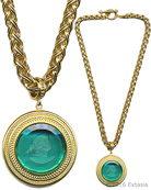 From our Mykonos Collection. Inspired by the beautiful waters off the Greek Island of Mykonos. In Gold Plate, transparent Seafoam German glass intaglio necklace. Large pendant measures 1 3/4 inches in diameter. Necklace length, 19 1/5 inches.  Each necklace made to order in the USA.