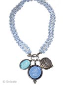 Classic Extasia best selling silhouette in Silver Plate, the three charm necklace shown here with faceted glass beads and transparent Sapphire and Aqua German glass intaglios, and one metal charm. Largest charm measures 1 1/4 inches in diameter. Convertible necklace can be worn doubled at 16 inches or as one long strand at 32 inches. Each necklace made to order in the USA.