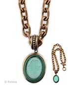 From our Minerva Collection, gorgeous Seamfoam green hand pressed German glass cameo pendant necklace. Cameo hangs from substantial medium weight 22 inch long bronze chain. Pendant is 1 1/8 by 1.5 inches. Seafoam is a semi transparent mint green. The color of the Spring Season. Shown in our signature Bronze metal. Each necklace made to order in the USA.