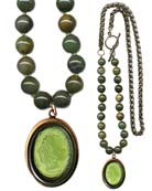 Sporty look with mixed metal and beaded necklace for a fresh seasonal look, over sweaters and Fall's heavier fabrics. Shown in an Olivine German glass cameo, with hand knotted dyed Jade beads. Necklace is 29 inches in length. Pendant is 1 1/2 by 1 1/4 inches. Shown in our signature bronze. Each necklace made to order in the USA from the world's finest materials.