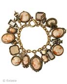 Beautiful hand-carved Italian shell cameos in this version of our classic 21 charm bracelet, the Charm du Jour.  Also includes several peach and taupe hand pressed German glass intaglios. Largest charm measures 1.25 inches long. Bracelet is 7 1/2 inches. Each bracelet lovingly made to order in the USA.