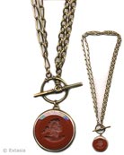 Convertible necklace gets a little fancy with two kinds of chain. Shown here with "hand" toggle with a opaque Marsala German glass intaglio. and convertible bronze chain at 36 or 18 inches. Can be worn as one long 36 inch necklace, or doubled as an 18 inch necklace. Large pendant is 1 1/4 inch in diameter.