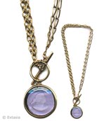 Convertible necklace gets a little fancy with two kinds of chain.  Shown here with "hand" toggle with a transparent Periwinkle German glass intaglio. and convertible bronze chain at 36 or 18 inches. Can be worn as one long 36 inch necklace, or doubled as an 18 inch necklace. Large pendant is 1 1/4 inch in diameter.