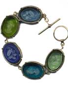 Oval intaglios make up this gorgeous bracelet shown in Sapphire, Olivine, Lapis, Zircon and Tormaline. Each earring made to order in the USA.