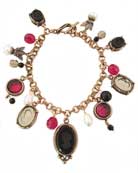 Our original charm bracelet has been updated and shown here in jet, ruby and black diamond, enhanced with freshwater pearls. Shown in Red Bronze.