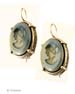 From our Victoriana Collection, a pretty Slate hand pressed German glass cameo earring. Soft image in a delicate metal setting, with decorative bezel. Slate is a warm and cool marbled gray, no two stones are ever alike.. Medium size earring measures 3/4 by 1/2 inch. French hook, shown in bronze.