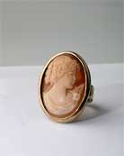 Hand-carved Italian shell cameo in a simple, elegant setting. Our largest ring, cameo measures 1 1/4 by 1 inch. Bronze. Stunning large ring.