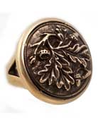Our acorn and oak leaf ring in red bronze. 1 inch in diameter.