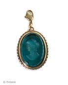 Our transparent Zircon blue green German glass intaglio charm is 1 1/8 by 7/8 inch. Attachable with lobster closure at the top, to either your own chain, or one of ours available from our website. Create your own charm bracelet or charm necklace! In our signature bronze metal. Each charm made to order in the U.S.A.
