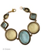 New Aqua & Jonquil Daughters of Dust classic style bracelet. Our hand pressedGerman glass intaglios in a lovely pastel combination for Spring, Summer. Center stone is 1 1/4 inches long. Bronze link bracelet is 7 1/2 inches. Each bracelet made to order in the U.S.A.