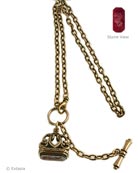 From our Watch Fob Collection, vintage European watch fob design now holds our Ruby German glass intaglio on the bottom face of fob. Transparent Ruby is a gorgeous jewel tone, necklace measures 17 inches. Fob pendant is just under 1 inch in size. Bronze metal, also available in Gold plate or Silver plate by request. Each necklace made to order in the USA.
