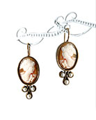 From our Elizabeth Collection, hand-carved Italian shell cameo earring. Classic styling for this cameo measuring 3/4 inch by 1/2 inch. Faux pearl accents. Bronze, French hook.