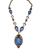 Sapphire intaglios accented with hand carved bone flowers with Red Bronze casting necklace. 22 inch length.