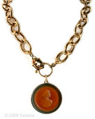 From our Oak & Stag Collection, in a Madeira German Glass Intaglio. Featured in Victoria Magazine. Transparent Madeira is a rich red/brown glass. Modern and Vintage create a fresh look with this bold bronze chain, and classic intaglio pendant. Each chain link measures 3/4 inch in length. Large pendant measures 1 1/2 inches in diameter. This is a large statement necklace. Shown in our signature bronze, also available in Silver Plate by request. 21 inches in length.