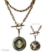 Slate Intaglio Globe Necklace, price: $263.00. Click on 'Large View' for large picture