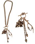 3 charms, acorn, oak leaf and antler hang from this convertible necklace that can be worn toggled at 17" or worn long at 34"