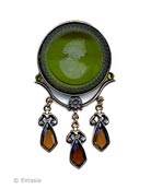 From our Mythos Collection, beautiful transparent Olivine German glass intaglio pin. 1 1/2 inches in diameter, this is a substantial pin. 2 3/4 inches total length from top of pin to bottom of longest drop. Drops are a deep transparent Madeira German glass. Shown in our signature Bronze metal. Each pin made to order in the USA.
