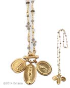 Three of our 19th century Victorian miniature reproductions are featured in one of our front closing toggle necklaces. Largest charm is 1 by 5/8 inch. When on the neck, charms will overlap each other. Metal is 14K Gold Plate over bronze. Each necklace made to order in the USA 
