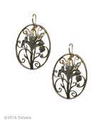 Beautiful iris floral motif earrings. Large but very light earrings measure approximately 1 1/4 by 1 inch. In our signature Bronze metal. 