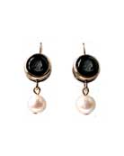 From our Marlene Collection, an opaque jet German glass intaglio in a clean styling with off white freshwater pearl drop. Classic coloration in black and white.  This small to medium size round earring is 1/2 inch (1cm) diameter. Bronze, French hook.