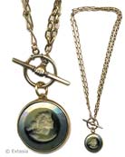 Convertible necklace gets a little fancy with two kinds of chain. Shown here with "hand" toggle with a opaque Slate German glass intaglio. and convertible bronze chain at 36 or 18 inches. Can be worn as one long 36 inch necklace, or doubled as an 18 inch necklace. Large pendant is 1 1/4 inch in diameter. 
