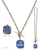 Dome back charm hangs from our convertible chain. Shown with transparent Sapphire German glass intaglio charm. Can be worn as one long strand at 32" or doubled at 16". Dome back is of Gothic quatrefoil design, so the pendant can be worn face forward or backward! Shown in our signature bronze metal. Pendant measures 3/4 inch. Each necklace made to order in the USA.