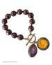 From our fall Scala Collection, opaque Ochre and transparent Amethyst German glass intaglio charms hang from a single strand of hand knotted, faceted Brown Jade. Handsome toggle closure. Largest charm measures 1 inch in diameter. Shown in our signature Bronze metal. Each bracelet made to order in the USA from the worlds finest materials.