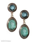 From our Scala Collection, a post drop earring measures two inches long by just over 1/2 inch wide. Transparent Seafoam and Aqua German glass intaglios. Shown in our signature bronze metal. 