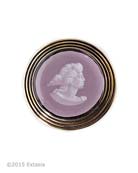 From our Scala Collection a transparent Amethyst German glass intaglio brooch. Brooch measures 1 1/2 inch in diameter.  Bronze metal. More color options available.