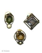 Scatter pins--ours feature three small intaglios set in  our signature Bronze metal. Intaglios shown in transparent Moss, Olivine and Black Diamond German Glass. Enrich your collars and lapels this fall ! Each pin measures approximately 1/2 inch wide. Made to order in the USA from the world's finest materials.