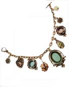 Sweet Victorian Garden charm bracelet in water colors with glass flowers and a bunny accent charm. Shown in Red Bronze with aqua, seafoam and peach. 